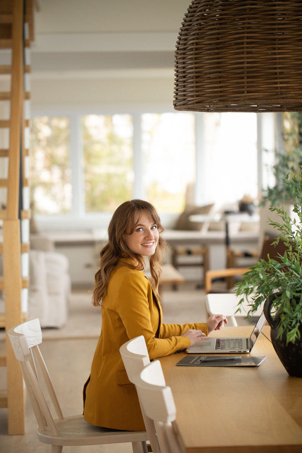 Elyse Gallagher REALTOR sitting at computer